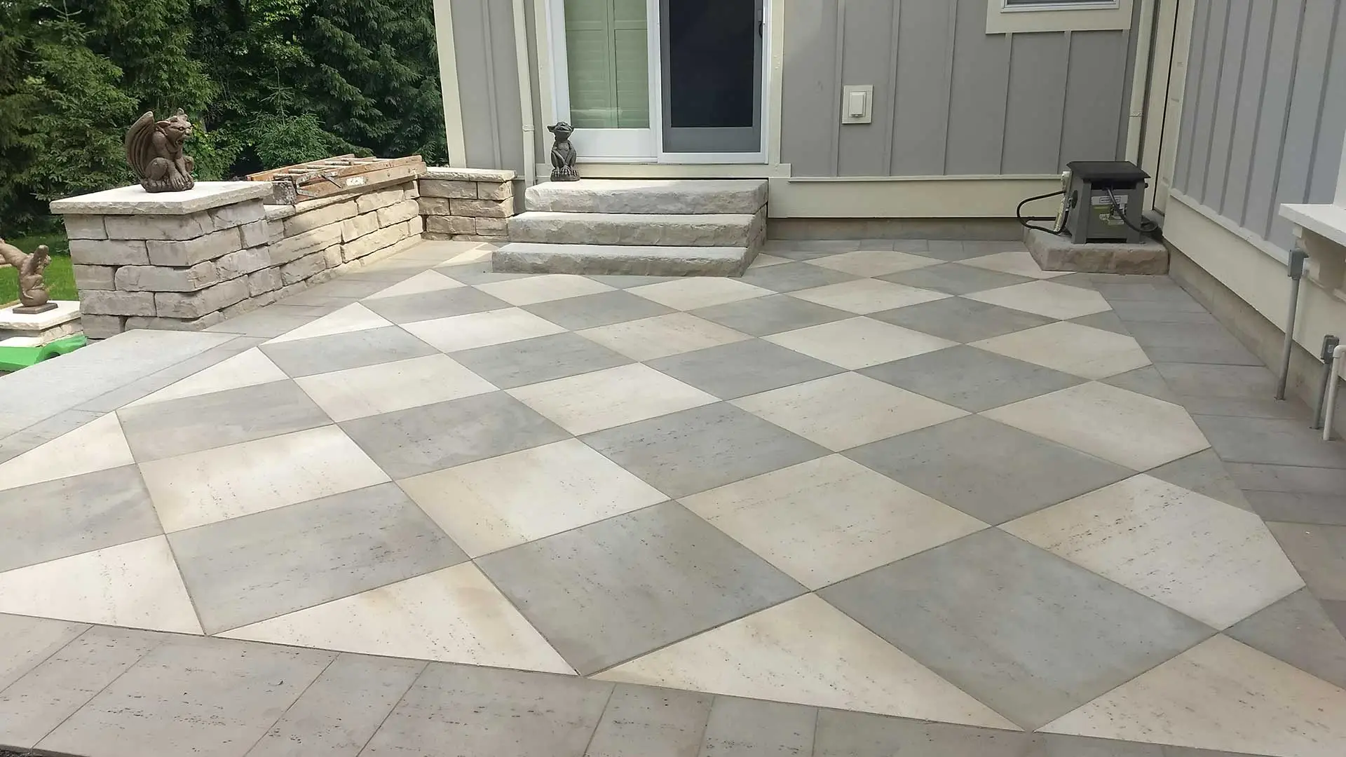 Checkered pattern patio construction in Grandville, MI.
