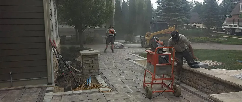 Custom paver patio and walkway being constructed at Grand Rapids, MI home.