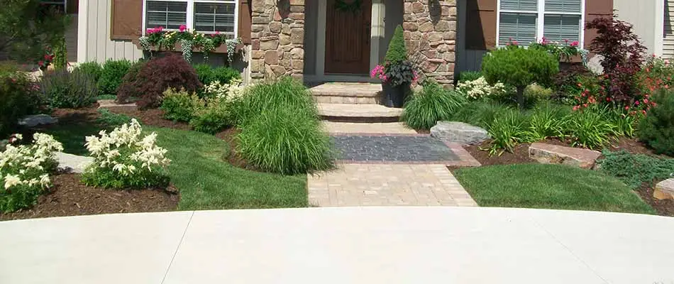 A Hudsonville, MI home with custom landscaping and plantings.