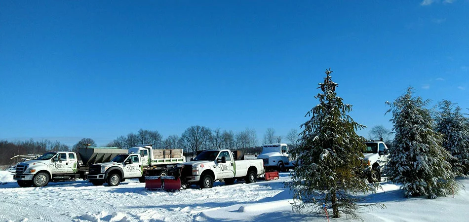 Fleet of Rose Landscape Services snow removal vehicles in Grand Rapids, MI.