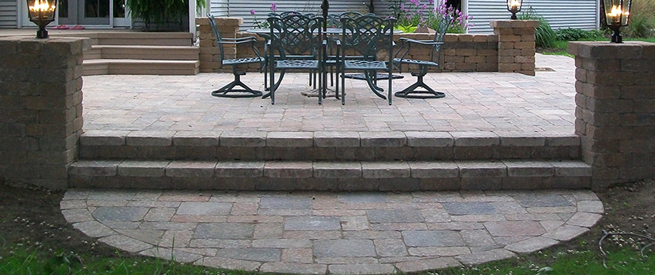 A paver patio custom built with outdoor steps in Zeeland, MI.