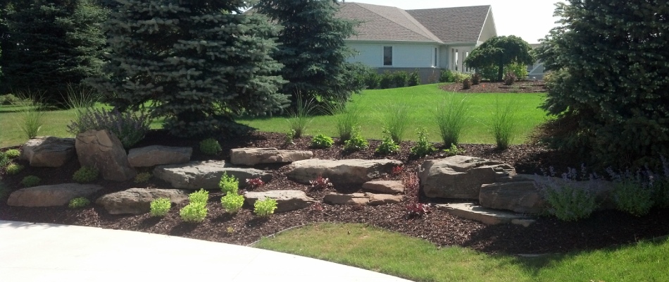 Renovated landscape bed with newly installed mulch in Wyoming, MI.