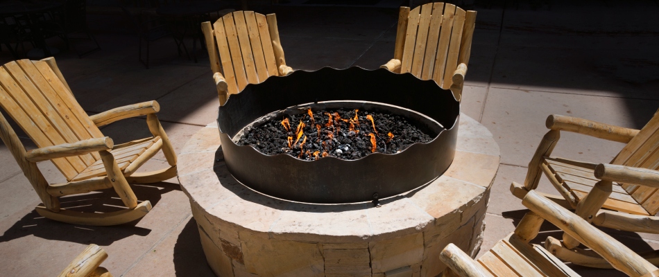 Custom built gas fire pit to scare off mosquitoes in Grand Haven, MI.