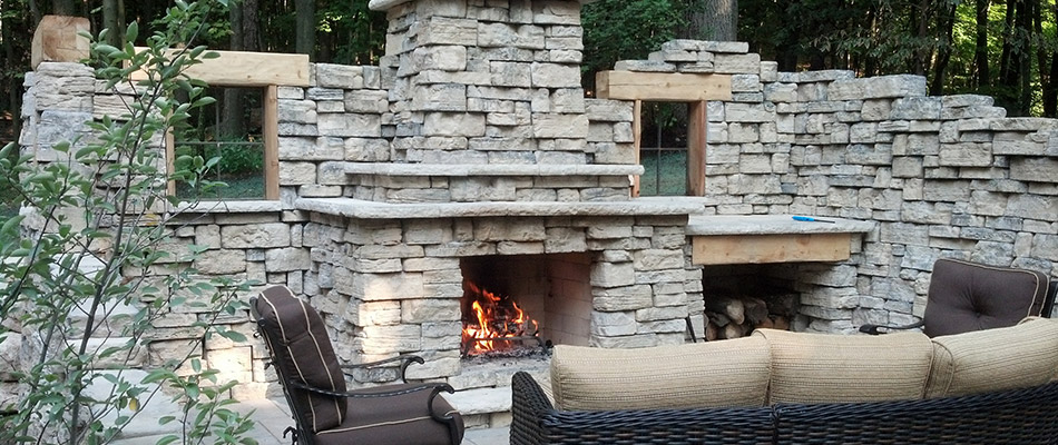 Custom fireplace built with stone pavers in West Olive, MI.