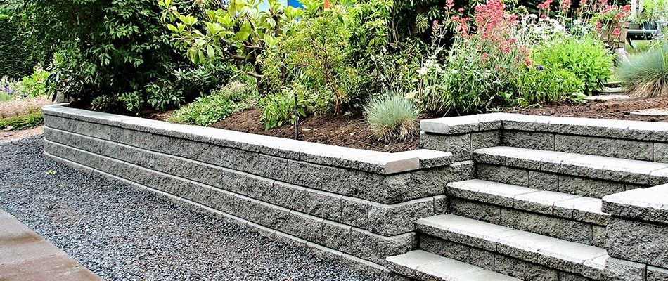 Retaining wall built with precision and excellence by professional hardscapers in and around Ada, MI.